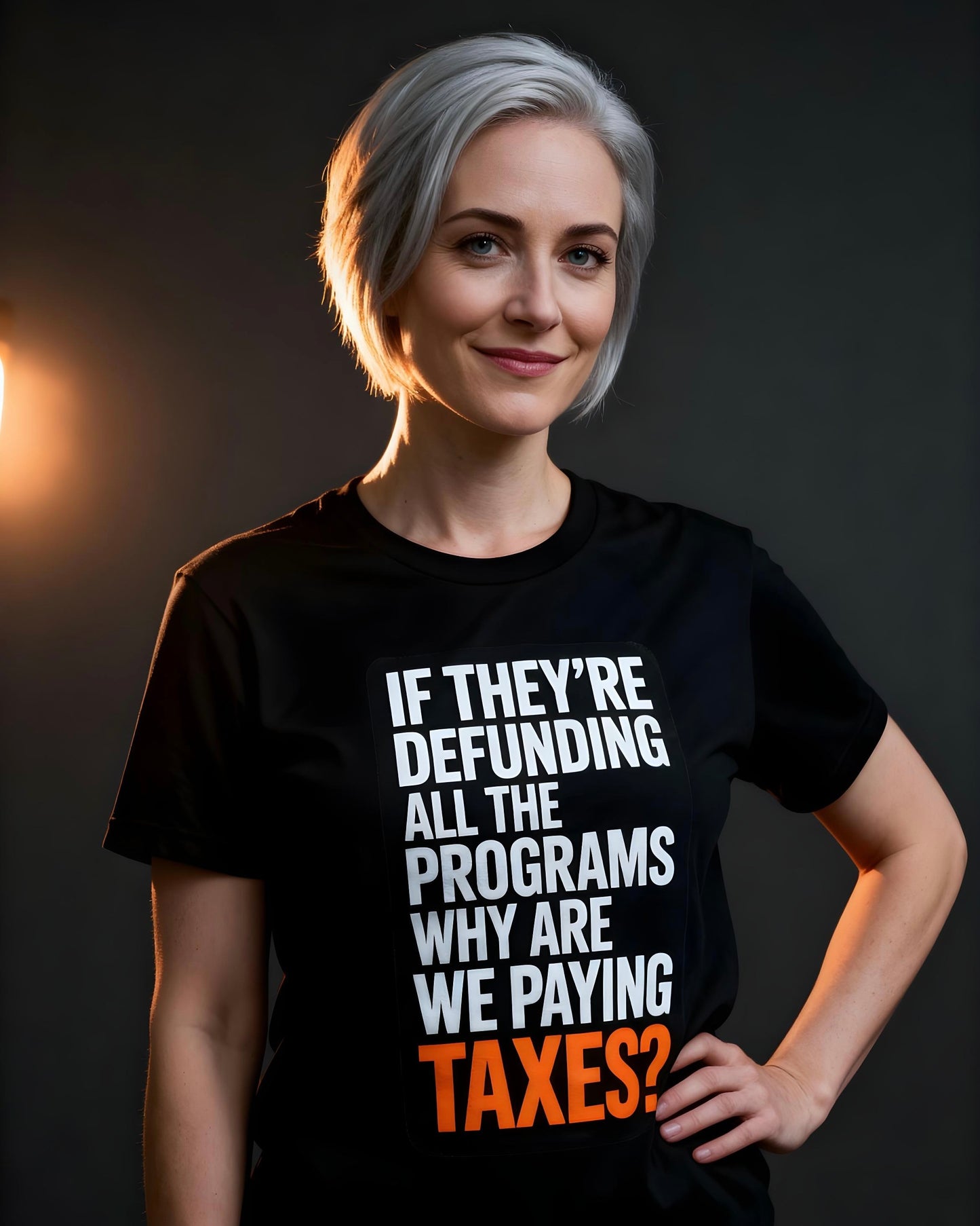 “If They’re Defunding All the Programs Why Are We Paying Taxes?” Unisex Protest Tee – Bella + Canvas 3001 | Made in USA | Unruly Thread Activist Shirt