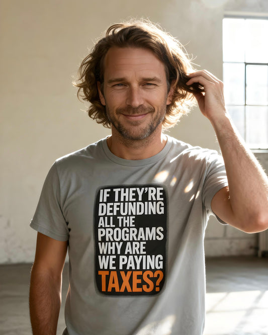 “If They’re Defunding All the Programs Why Are We Paying Taxes?” Unisex Protest Tee – Bella + Canvas 3001 | Made in USA | Unruly Thread Activist Shirt